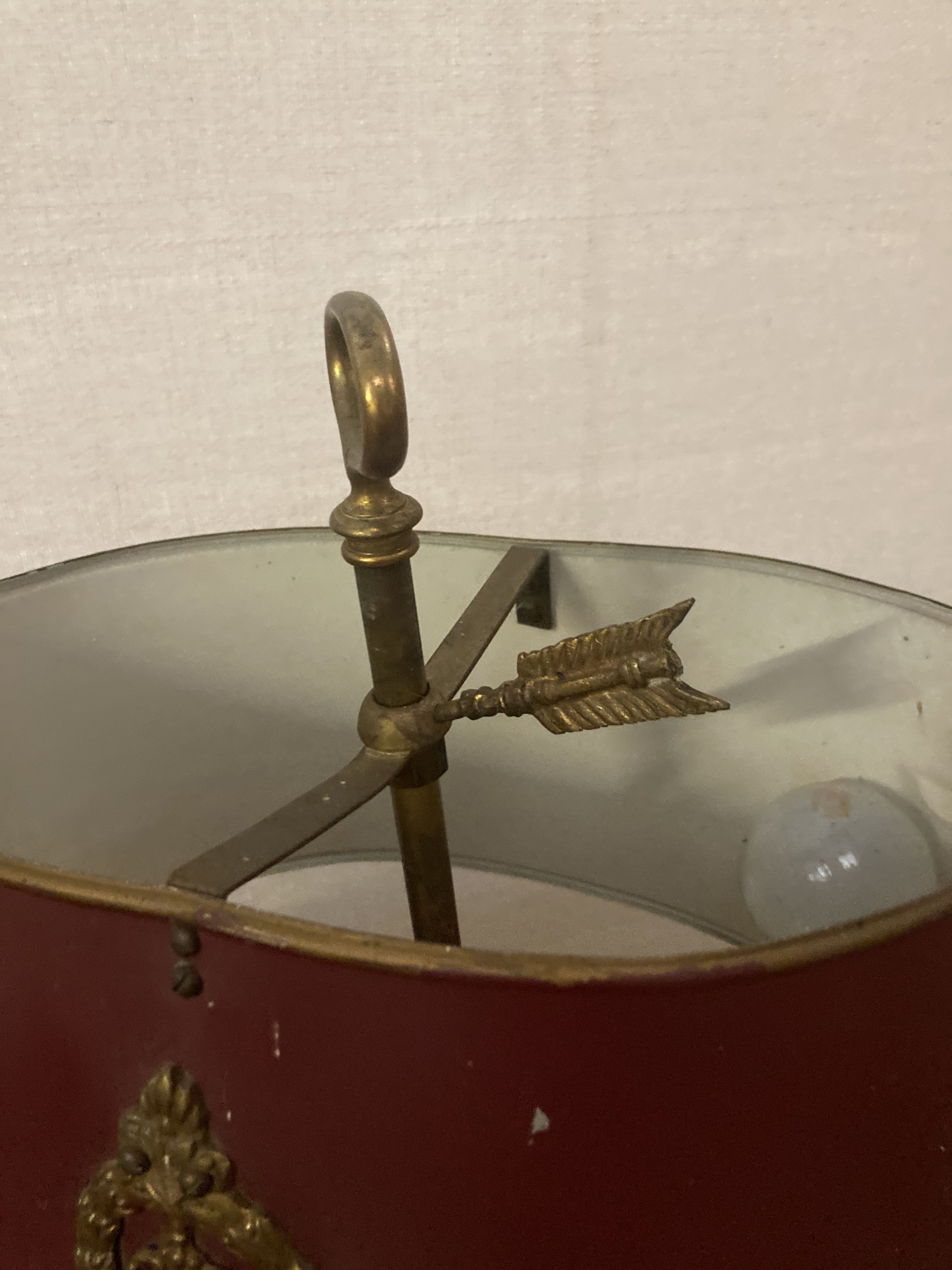 A brass table lamp with toleware shade, height 56cm, together with a parcel gilt painted wood table lamp